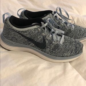 Blue Nike running shoes